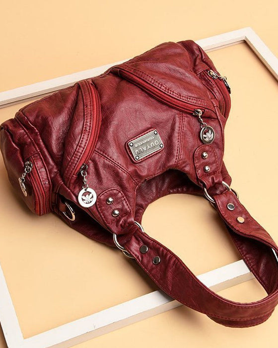 Sac à main messenger en cuir souple vintage