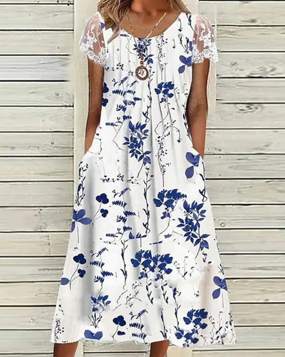 Robe fleurie avec manches en dentelle