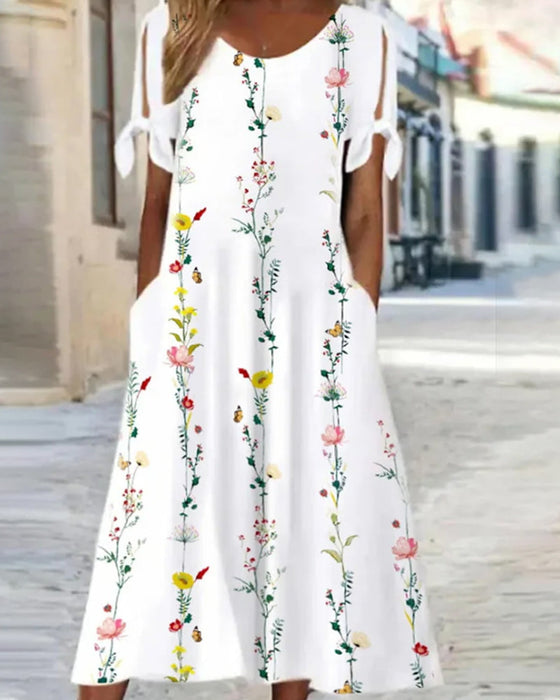Robe mi-longue à col rond et imprimé floral
