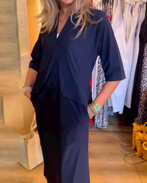 Robe à poches et col en v