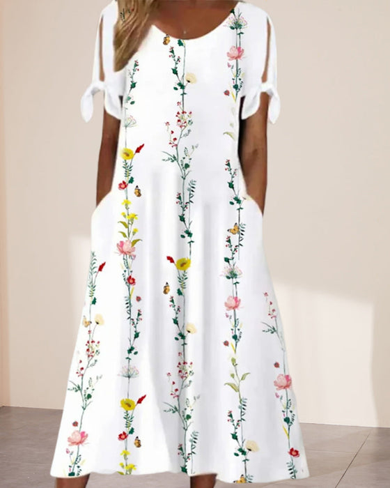Robe mi-longue à col rond et imprimé floral