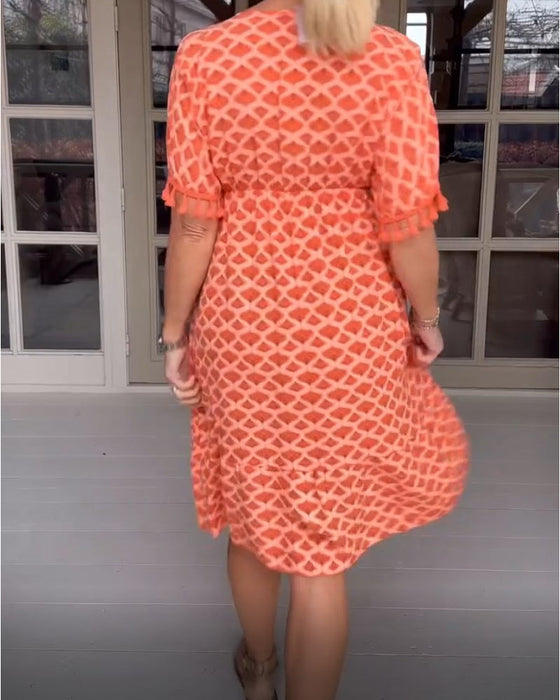 Robe col V imprimée à franges