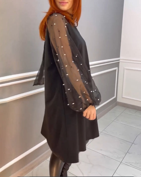Robe ample en maille à col haut