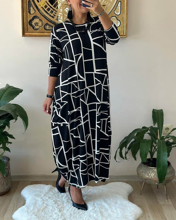 Robe ample avec poche et col rond