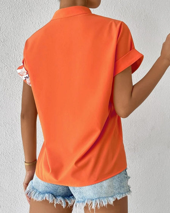 Chemisier à imprimé floral à empiècements avec bouton et manches courtes