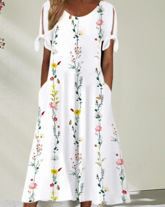 Robe mi-longue à col rond et imprimé floral