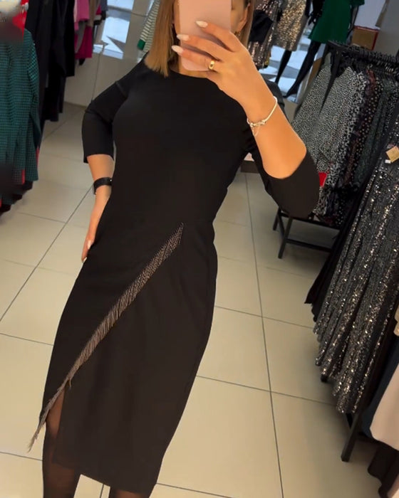 Robe fendue à col rond