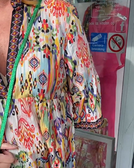 Robe longue élégante imprimée col V