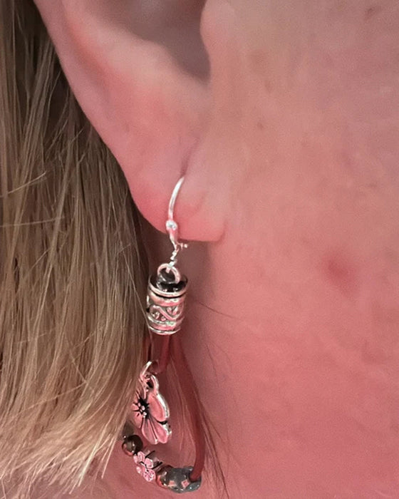 Boucles d'oreilles simples en cuir boho avec fleur en corde