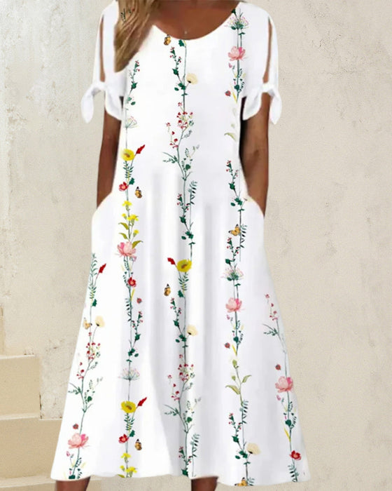 Robe mi-longue à col rond et imprimé floral