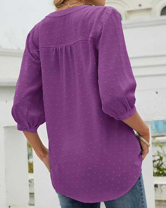 Chemise à col montant et manches mi-longues