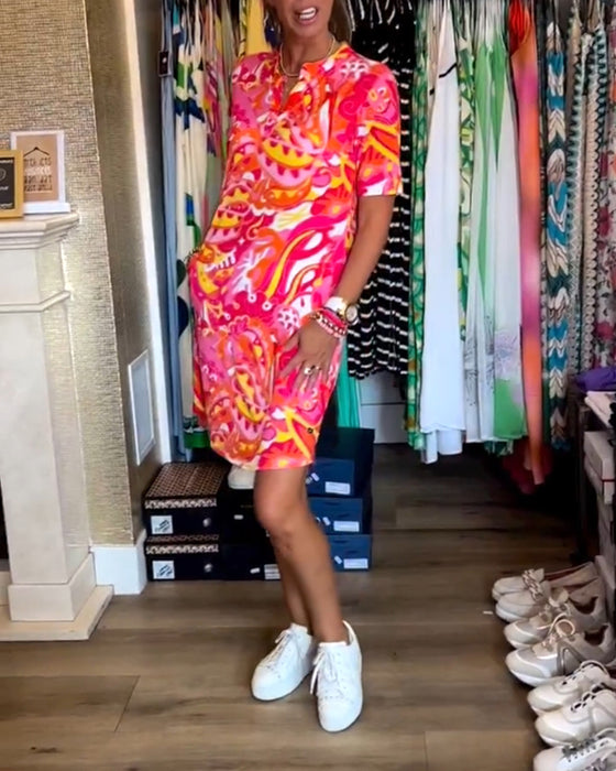 Robe avec poches et imprimés et manches courtes