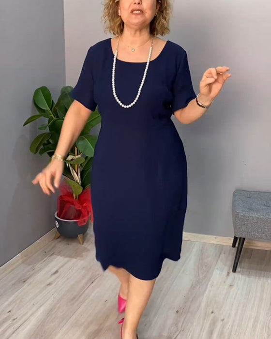 Robe élégante à manches courtes de couleur unie