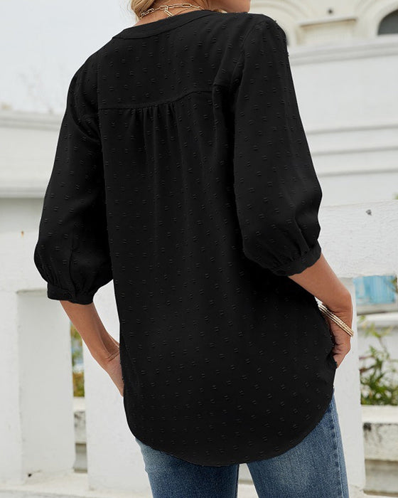 Chemise à col montant et manches mi-longues