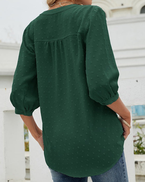 Chemise à col montant et manches mi-longues