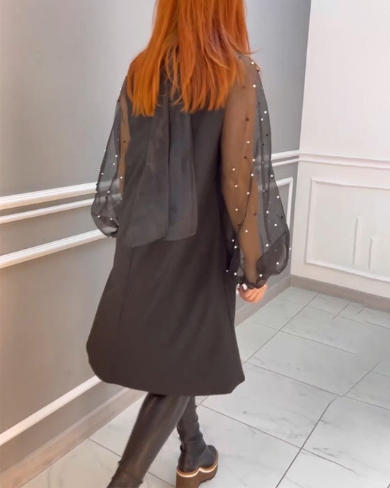 Robe ample en maille à col haut