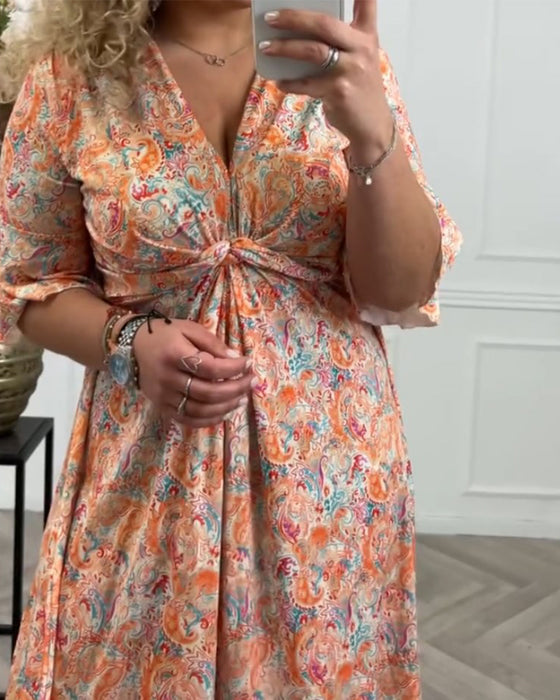 Robe à col V et twist et imprimé