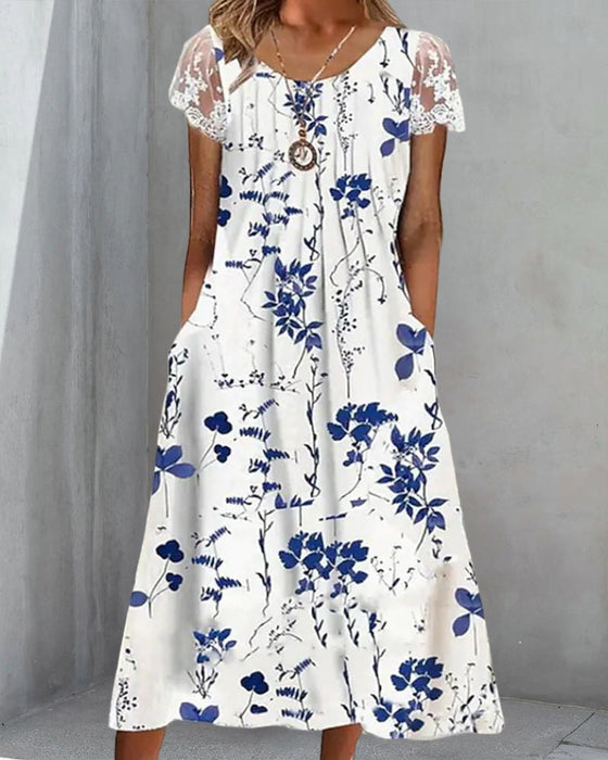 Robe fleurie avec manches en dentelle