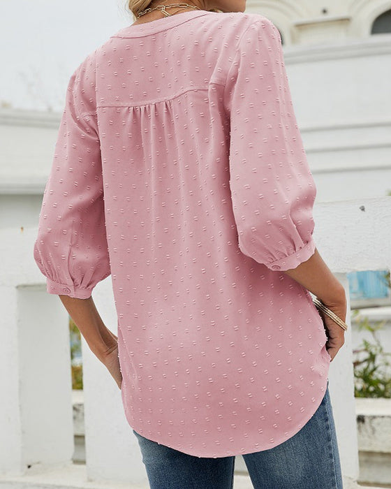 Chemise à col montant et manches mi-longues