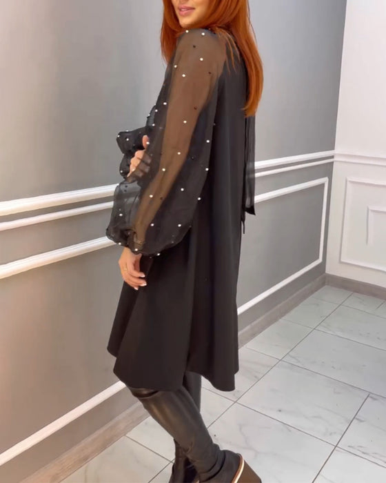 Robe ample en maille à col haut