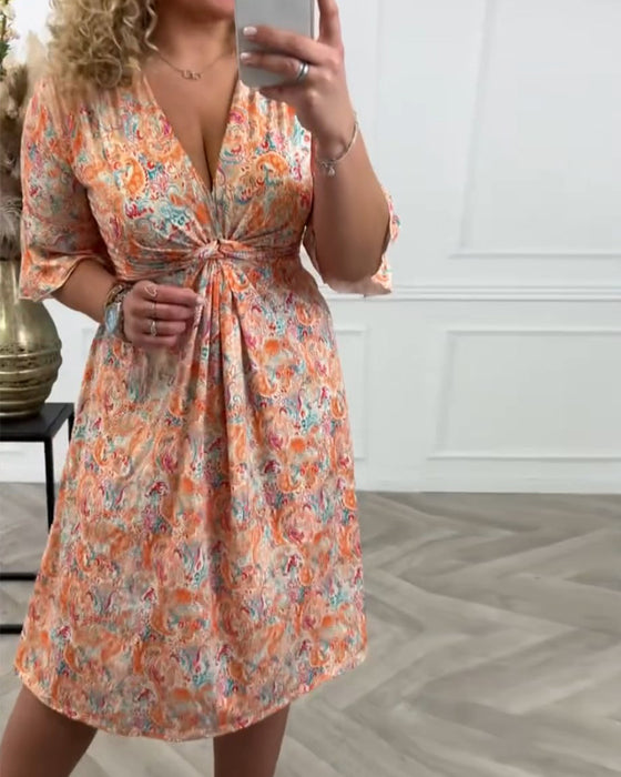 Robe à col V et twist et imprimé