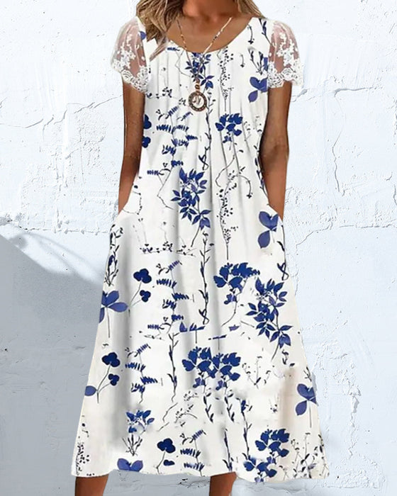 Robe fleurie avec manches en dentelle