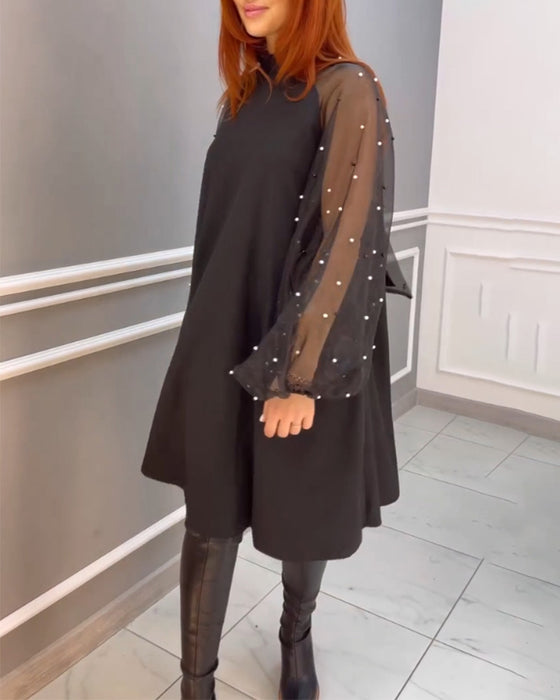 Robe ample en maille à col haut