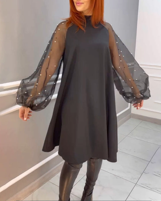 Robe ample en maille à col haut