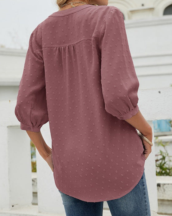 Chemise à col montant et manches mi-longues