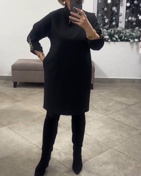 Robe à col montant de couleur unie