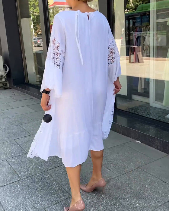 Robe en dentelle à col rond