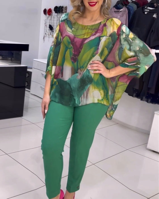 Blouse imprimée à col rond et manches chauve-souris