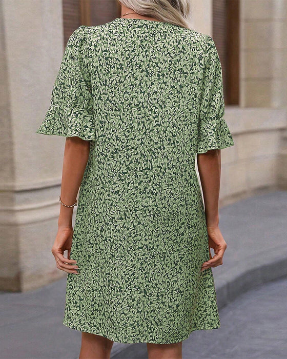 Robe élégante imprimée col V