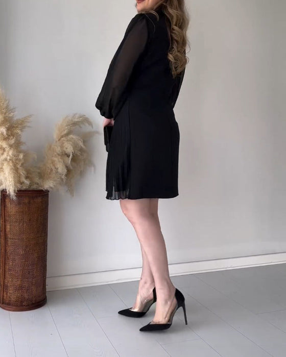 Robe à plis et revers