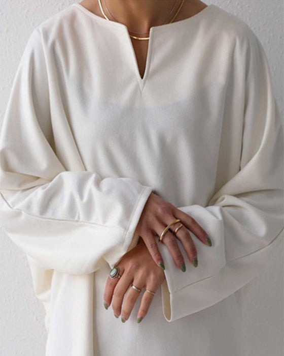 Haut ample de couleur unie à col en V