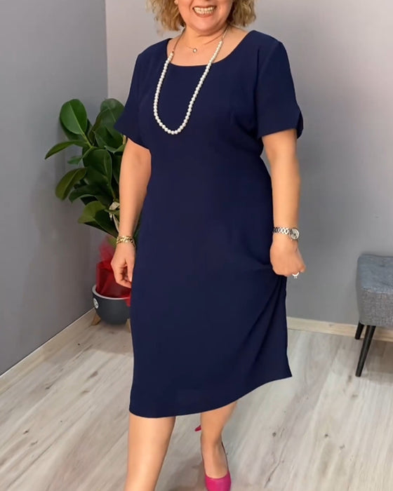 Robe élégante à manches courtes de couleur unie