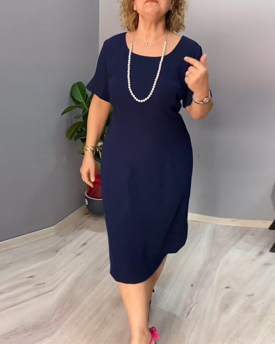 Robe élégante à manches courtes de couleur unie