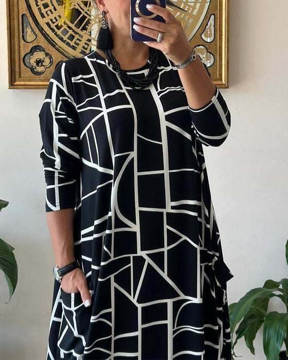 Robe ample avec poche et col rond