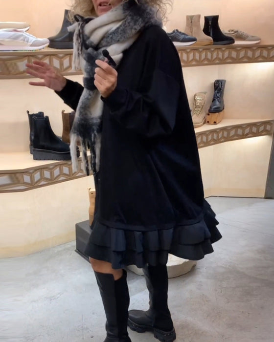 Robe à la silhouette élégante et aux manches longues