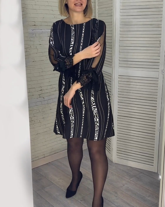 Robe mi-longue à rayures