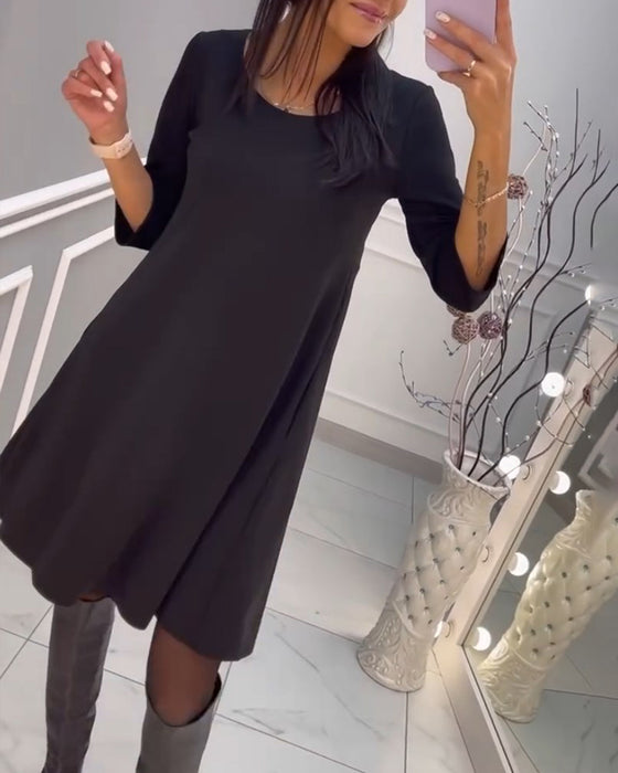 Robe unie avec nœud au dos