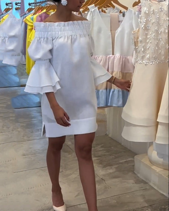 Robe asymétrique à manches évasées