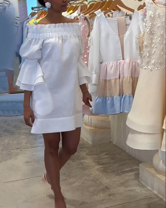 Robe asymétrique à manches évasées