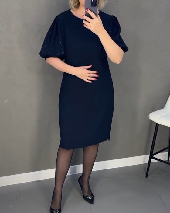 Robe élégante à manches courtes bouffantes