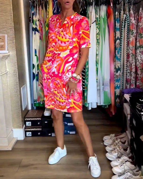 Robe avec poches et imprimés et manches courtes