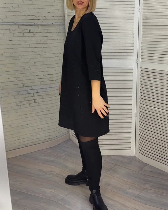 Robe élégante à col en V et manches trois-quarts